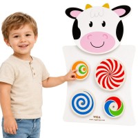 Drewniana tablica manipulacyjna sensoryczna - krówka