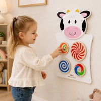Drewniana tablica manipulacyjna sensoryczna - krówka